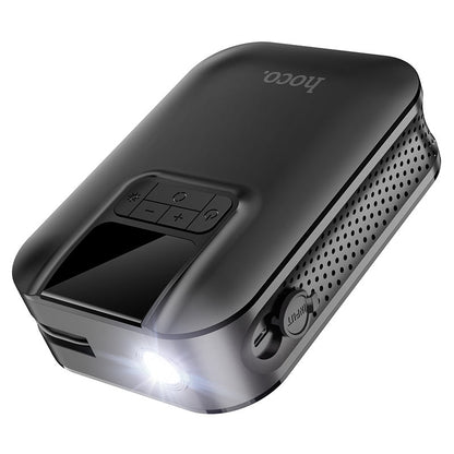 Hoco S53 portable smart air pump digital tire inflator with LED display and emergency light shown inflating a car tire in the UAE